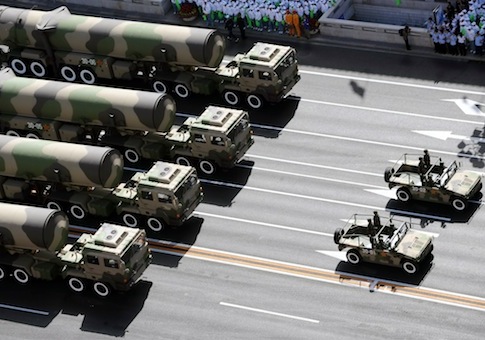 Chinese vehicles armed with Dongfeng 31A missile / AP