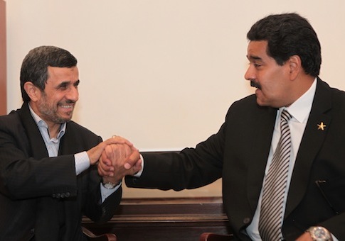 Mahmoud Ahmadinejad, Nicolas Maduro / AP