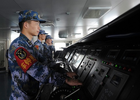 Sailors working on the Chinese aircraft carrier Liaoning / AP