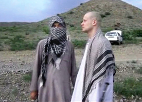Sgt. Bowe Bergdahl, right, stands with a Taliban fighter in eastern Afghanistan / AP