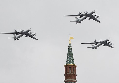 Russian Air Force Tu-95 bombers fly in formation over Red Square / AP