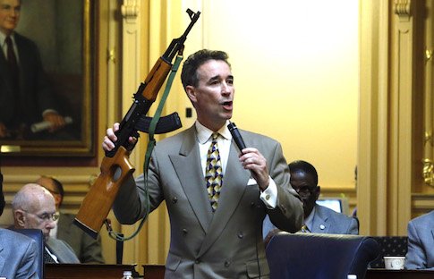 Del. Joe Morrissey (D.) holds up an AK47-style rifle on the floor of the Virginia General Assembly / AP