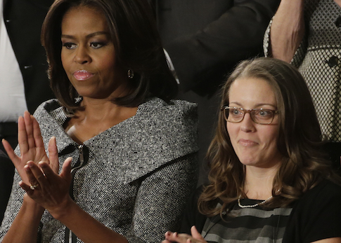 First lady Michelle Obama with State of the Union guest Rebekah Erler / AP