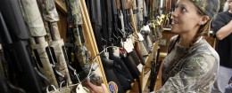 Shotguns in a Richmond, Va., gun store / AP