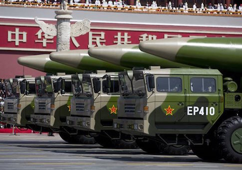 Military vehicles carrying DF-26 ballistic missiles, drive past Tiananmen Gate during a military parade to commemorate the 70th anniversary of the end of World War II, in Beijing Thursday, Sept. 3, 2015 / AP
