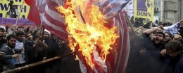 Iranian demonstrators burn representations of the U.S. flag during an annual rally in front of the former U.S. Embassy in Tehran, marking 36th anniversary of the seizure of the embassy / AP