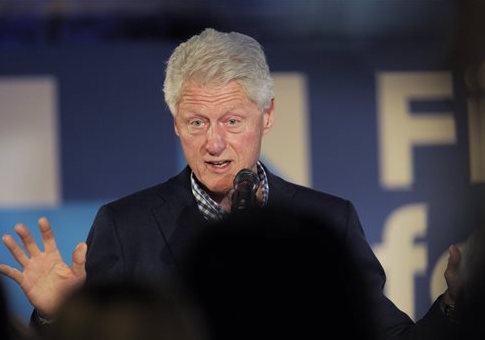 Bill Clinton at a Massachusetts rally for his wife / Christine Peterson/Worcester Telegram & Gazette via AP