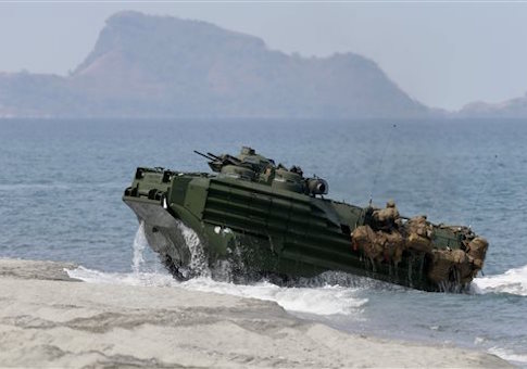 A U.S. Navy amphibious assault vehicle is seen on a beach facing Scarborough Shoal. / AP