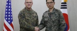 South Korean Defense Ministry Director General Maj. Gen. Jang Kyung-soo, right, and U.S. Forces Korea's Maj. Gen. Robert Hedelund pose for photographers prior to their working-level talk on deploying the THAAD U.S. missile defense system in South Korea, at Defense Ministry in Seoul, South Korea, March 4, 2016. Kim Hong-Ji / Pool Photo via AP
