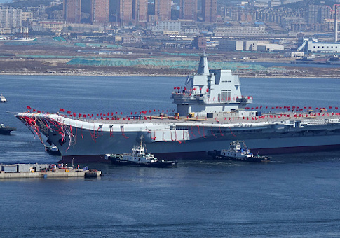 Type 001A, China's second aircraft carrier, is transferred from the dry dock into the water during a launch ceremony at Dalian shipyard