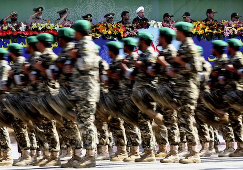 Military forces marching during an annual military parade in Tehran, Iran, Sunday, Sept, 22, 2013