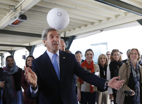U.S. Secretary of State Kerry heads a soccer ball made in Afghanistan as he meets with Afghan women entrepreneurs at the U.S. Embassy in Kabul