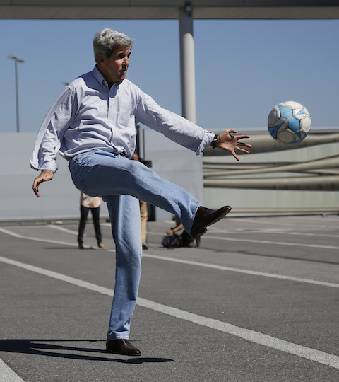 John Kerry performs an un-American act. (AP)