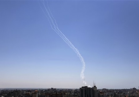 Smoke trails are seen after missiles were fired by Palestinian militants from Gaza City towards southern Israel