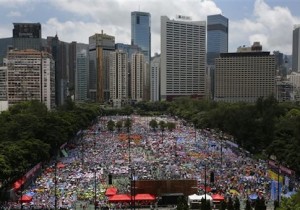 Tens of thousands of people gather at Hong Kong's Victoria park to join a protest march to oppose a planned civil disobedience campaign by pro-democracy activists in Hong Kong