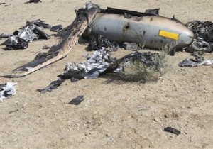 This undated photo released Monday, Aug. 25, 2014 by the Iranian Revolutionary Guards, claims to show the wreckage of an Israeli drone which Iran claims it shot down near an Iranian nuclear site
