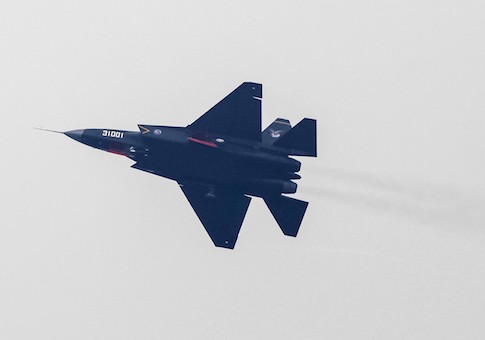 A J-31 stealth fighter of the Chinese People's Liberation Army Air Force is seen during a test flight ahead of the 10th China International Aviation and Aerospace Exhibition in Zhuhai, Guangdong province, November 10, 2014