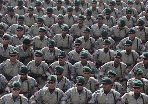 Iranian navy members march in a parade marking National Army Day