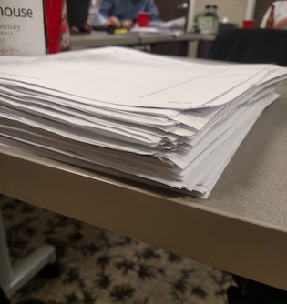 stack of paper exit polls