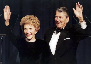 File photo of former U.S. President Ronald Reagan and his wife Nancy waving while attending a gala celebrating his 83rd birthday in Washington
