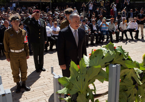Israeli Prime Minister Benjamin Netanyahu lays a wreath during a ceremony marking the annual Holocaust Remembrance Day at the Yad Vashem Holocaust memorial, in Jerusalem