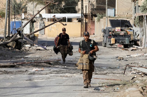 Iraqi counterterrorism forces walk in Falluja