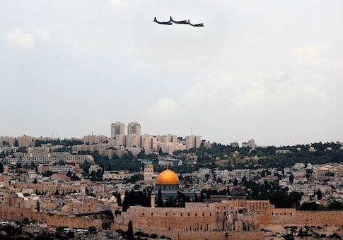 Israeli C-130 transport planes perform a fly over Jerusalem during celebrations marking Israels 69th Independence Day