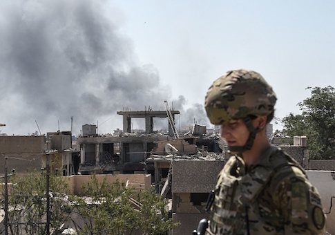 A U.S. soldier advising Iraqi forces is seen in the city of Mosul