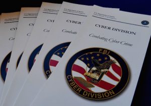 FBI brochures on combating cyber crime on display at the Cyber Crime Prevention Symposium in Los Angeles, California