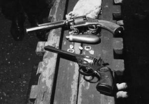 A 1950s Webley .22 revolver and an old muzzleloader