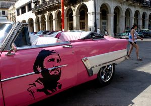 An American car decorated with the image of late Cuban leader Fidel Castro in HavanaAn American car decorated with the image of late Cuban leader Fidel Castro in Havana