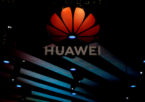 FILE PHOTO: Huawei logo is pictured during the media day for the Shanghai auto show in Shanghai