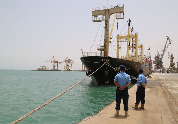 Yemeni coast guards look on at Saleef port in the western Red Sea Hodeida province