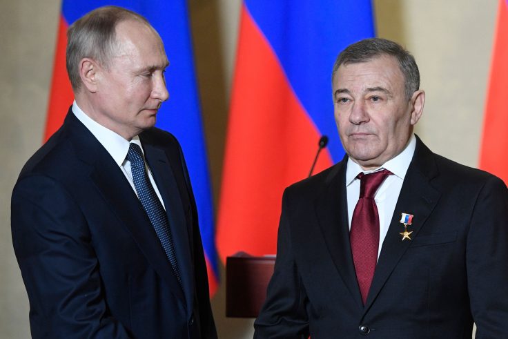 Russian President Vladimir Putin decorates businessman Arkady Rotenberg with the Hero of Labour medal